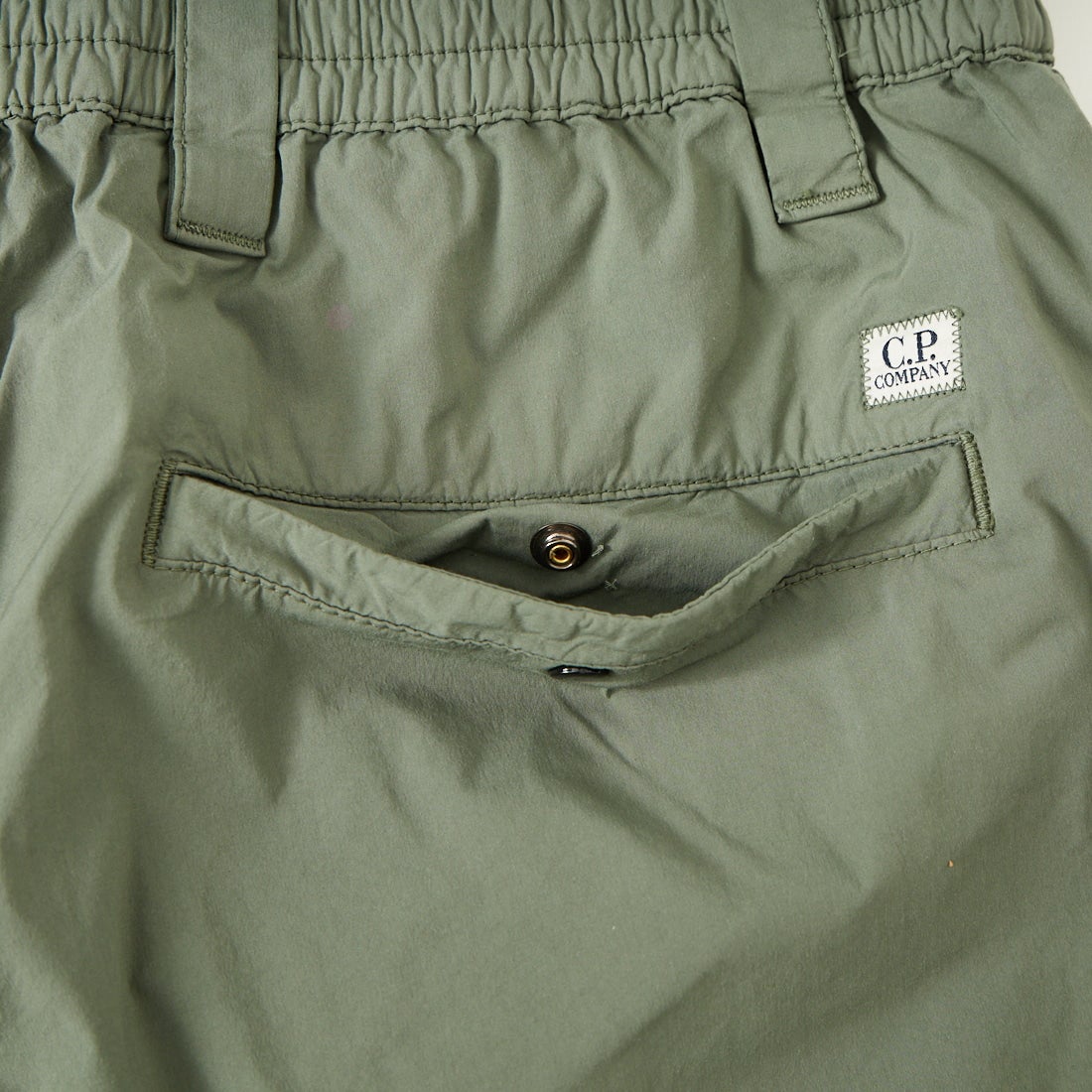 C.P.COMPANY [シーピーカンパニー] 50 FILI STRETCH バミューダカーゴショーツ [20CMBE254A] 668 LAUREL