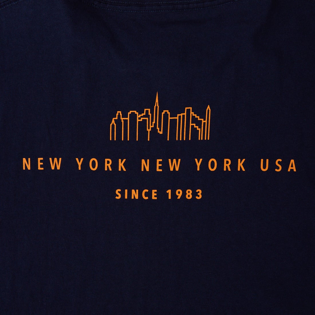 MANHATTAN PORTAGE [マンハッタンポーテージ] 別注 ショート丈 ロゴプリントTシャツ [26SSMP-INL017-JF] NAVY