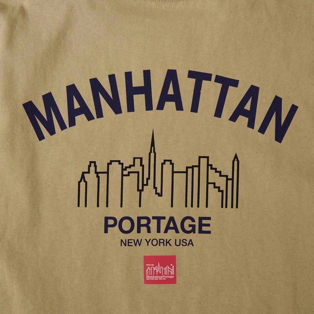 MANHATTAN PORTAGE [マンハッタンポーテージ] 別注 アーチプリントTシャツ [26SSMP-IN85-JF] BEIGE