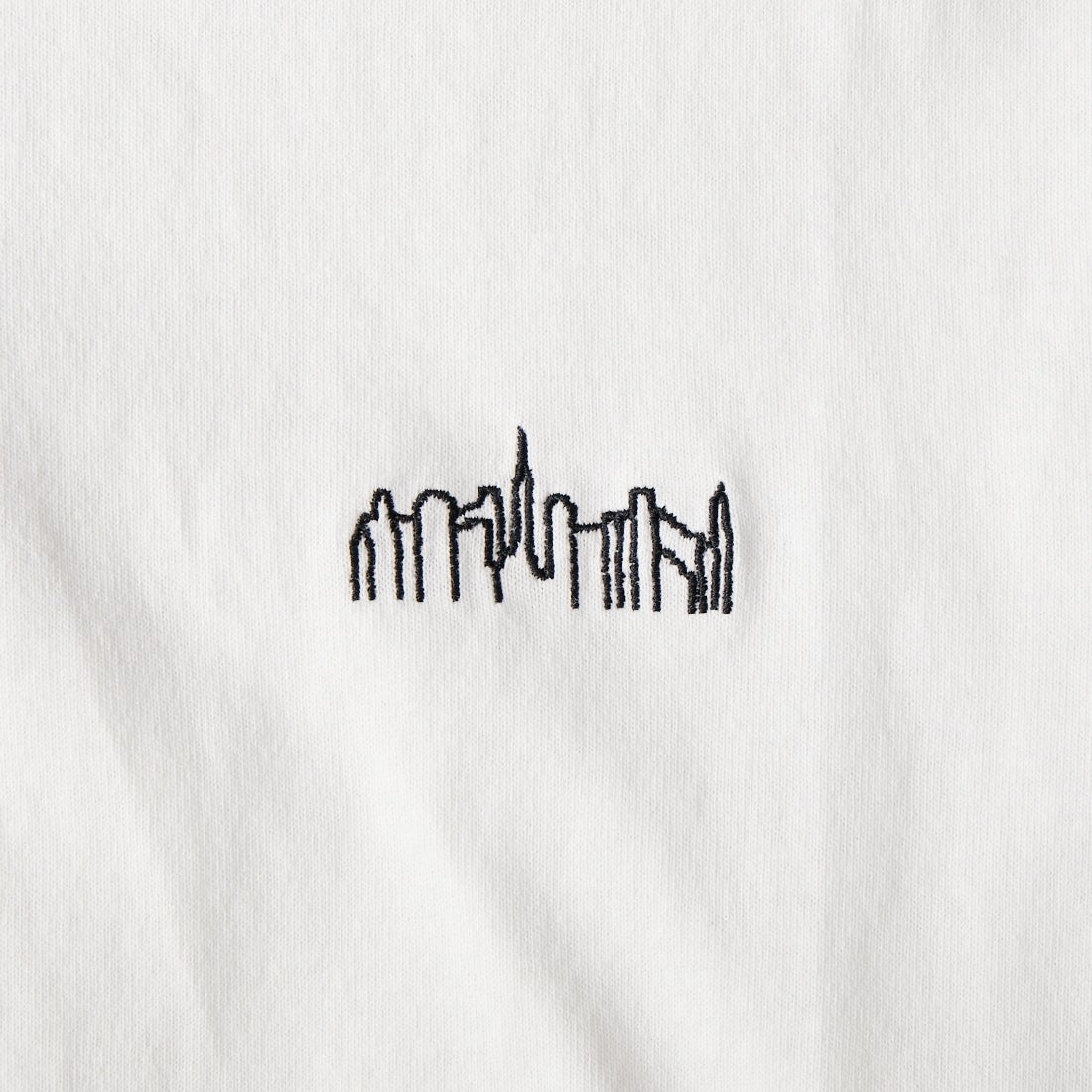 MANHATTAN PORTAGE [マンハッタンポーテージ] 別注 アーチプリントTシャツ [26SSMP-IN85-JF] WHITE