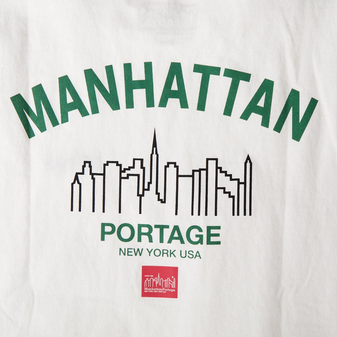 MANHATTAN PORTAGE [マンハッタンポーテージ] 別注 アーチプリントTシャツ [26SSMP-IN85-JF] WHITE