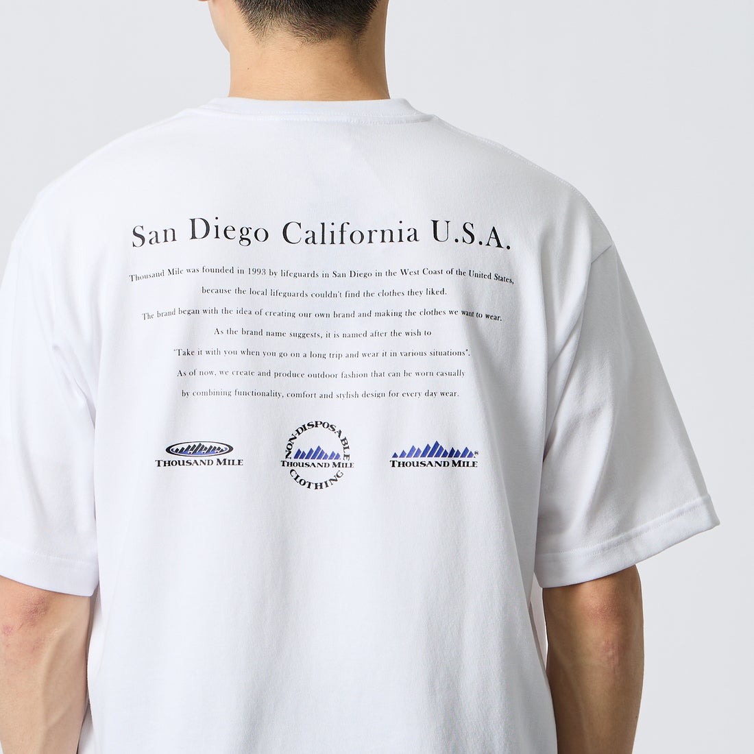 THOUSAND MILE [サウザンド マイル] ヒストリーロゴ バックプリント ショートスリーブTシャツ [TM261TC00480] 01 WHITE &&モデル身長：168cm 着用サイズ：M&&