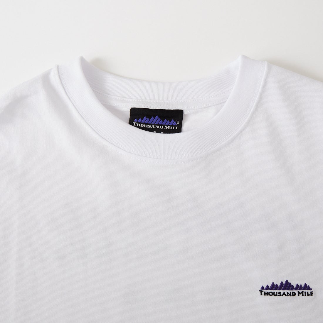 THOUSAND MILE [サウザンド マイル] ブランドロゴ バックプリント ショートスリーブTシャツ [TM261TC00460] 01 WHITE
