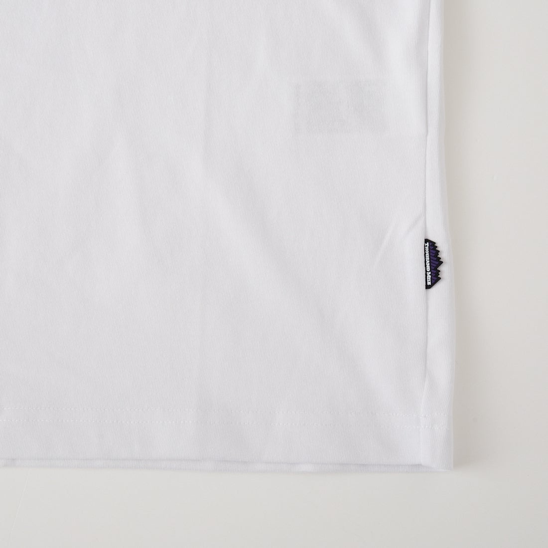 THOUSAND MILE [サウザンド マイル] ブランドロゴ バックプリント ショートスリーブTシャツ [TM261TC00460] 01 WHITE
