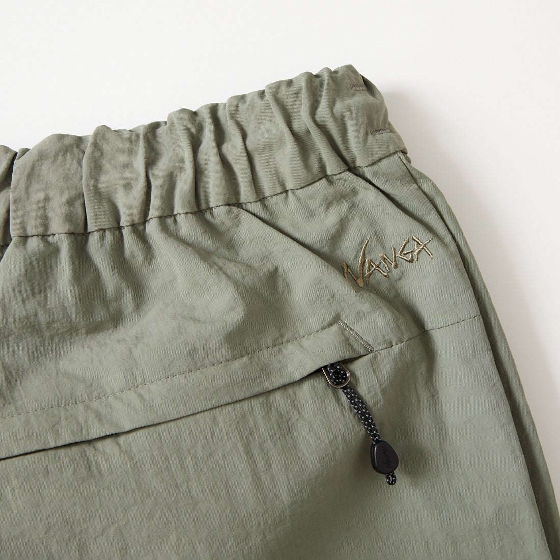 NANGA [ナンガ] ナイロンタッサートラックパンツ [N2600-1D133A] KHA