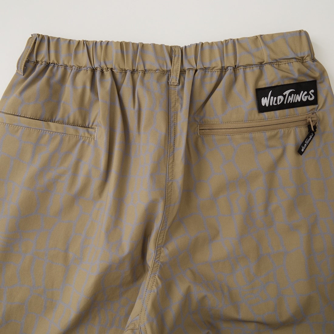 WILD THINGS [ワイルドシングス] エラスティックナイロン プリントラックスパンツ [WT26038AD] SPIDER BEG