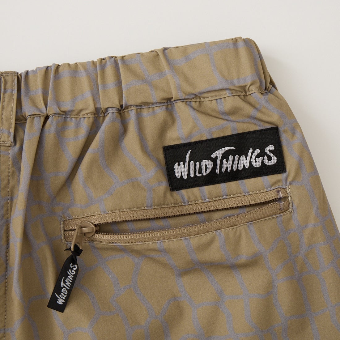 WILD THINGS [ワイルドシングス] エラスティックナイロン プリントラックスパンツ [WT26038AD] SPIDER BEG