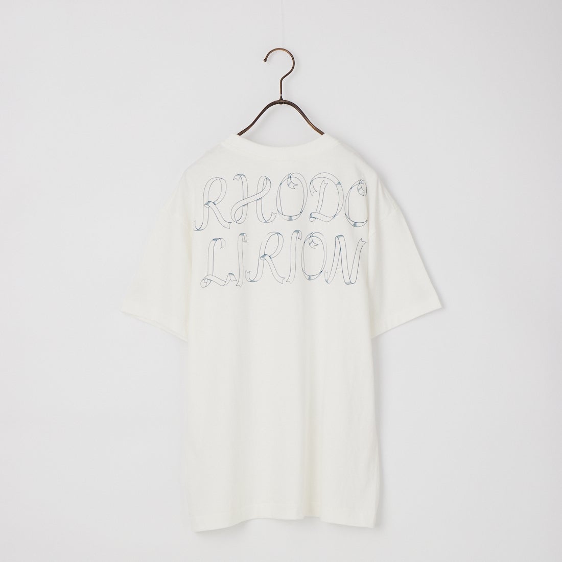 RhodolirioN [ロドリリオン] PRINTED MAKING A BOW WITH RIBBON TEE [SW1058] A WHITE