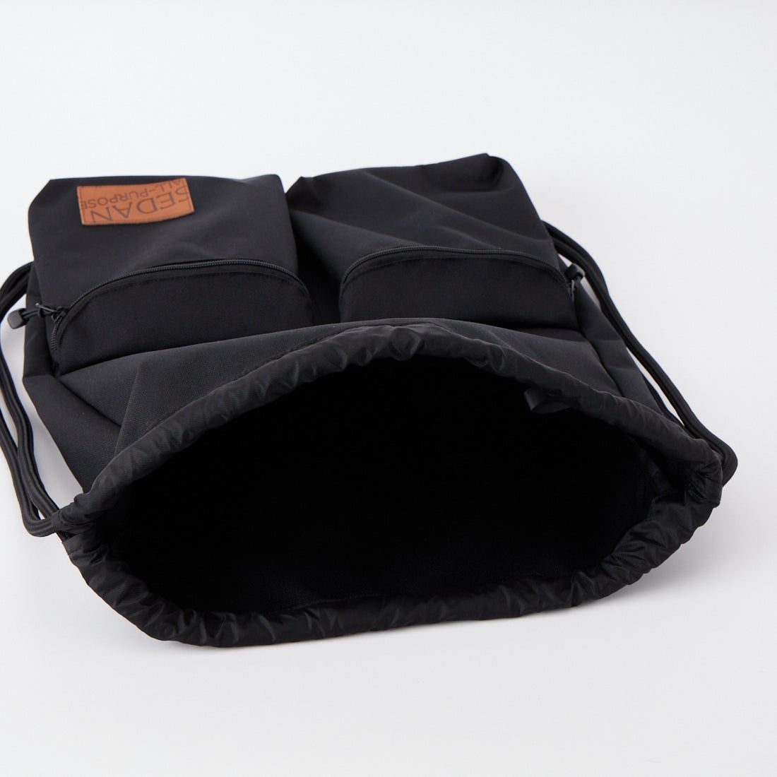 SEDAN ALL-PURPOSE [セダン オールパーパス] ドローストリング ナップサック [SD26S-BG03] BLACK