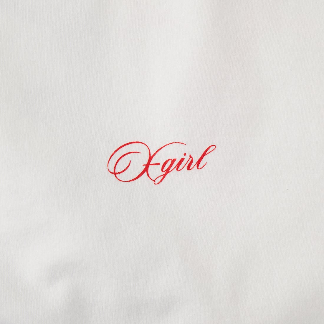 X-girl [エックスガール] カーシブスクリプトロゴ＆フェイス 半袖Tシャツ [105261011011] WHITE
