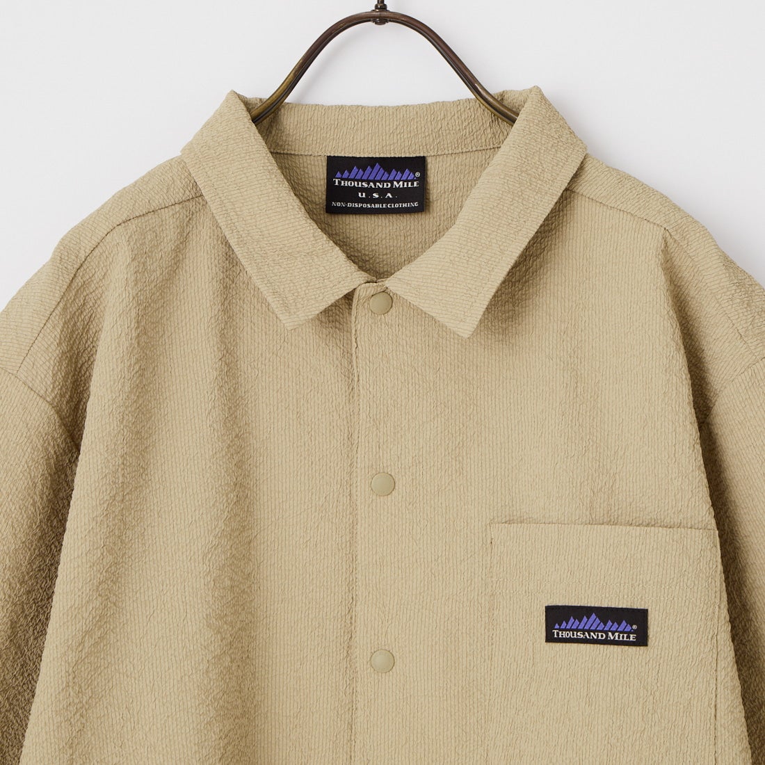 THOUSAND MILE [サウザンド マイル] 別注 シアサッカー サマーバケーション ワイドパンツセットアップ [TM261SS50812-JF] 23 BEIGE