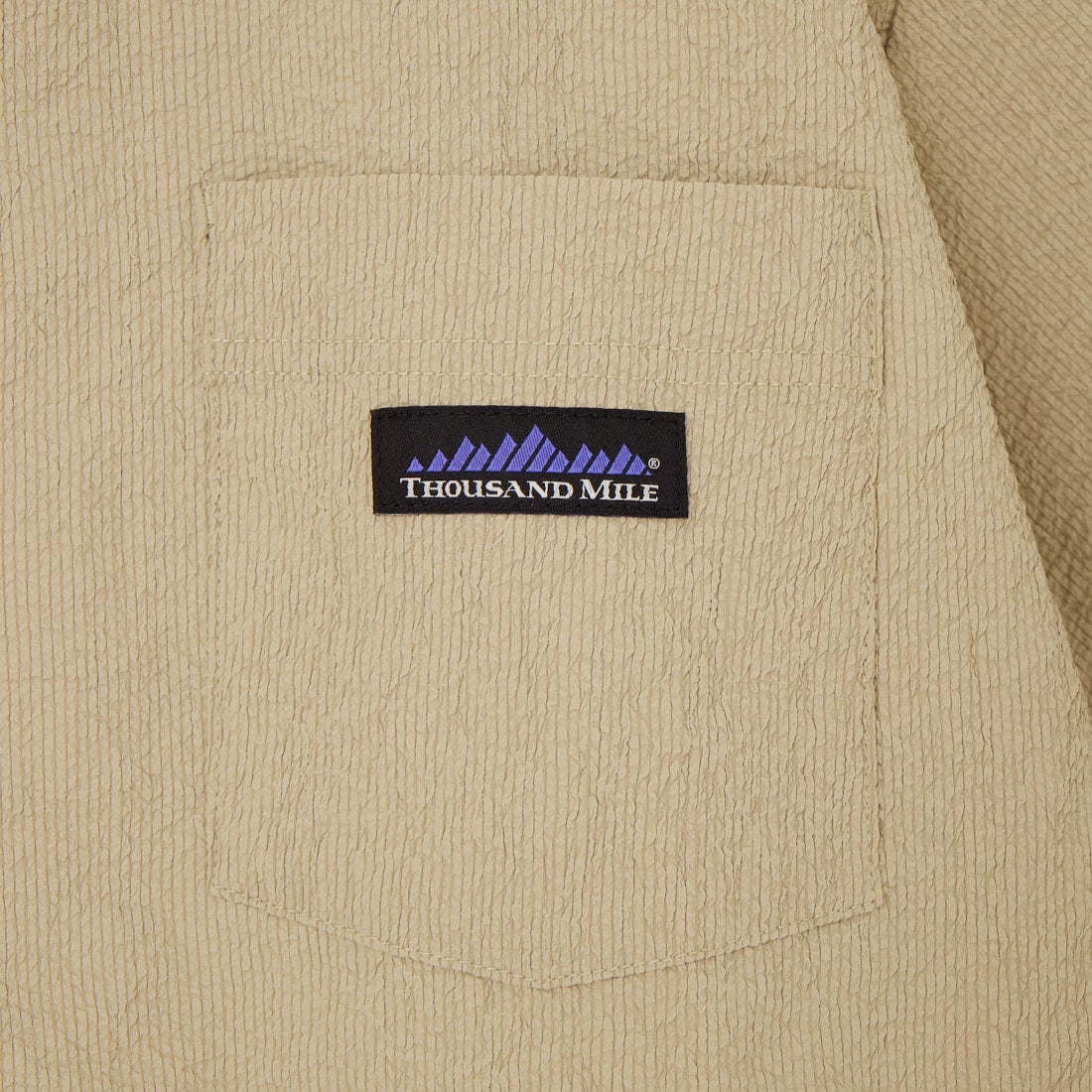 THOUSAND MILE [サウザンド マイル] 別注 シアサッカー サマーバケーション ワイドパンツセットアップ [TM261SS50812-JF] 23 BEIGE