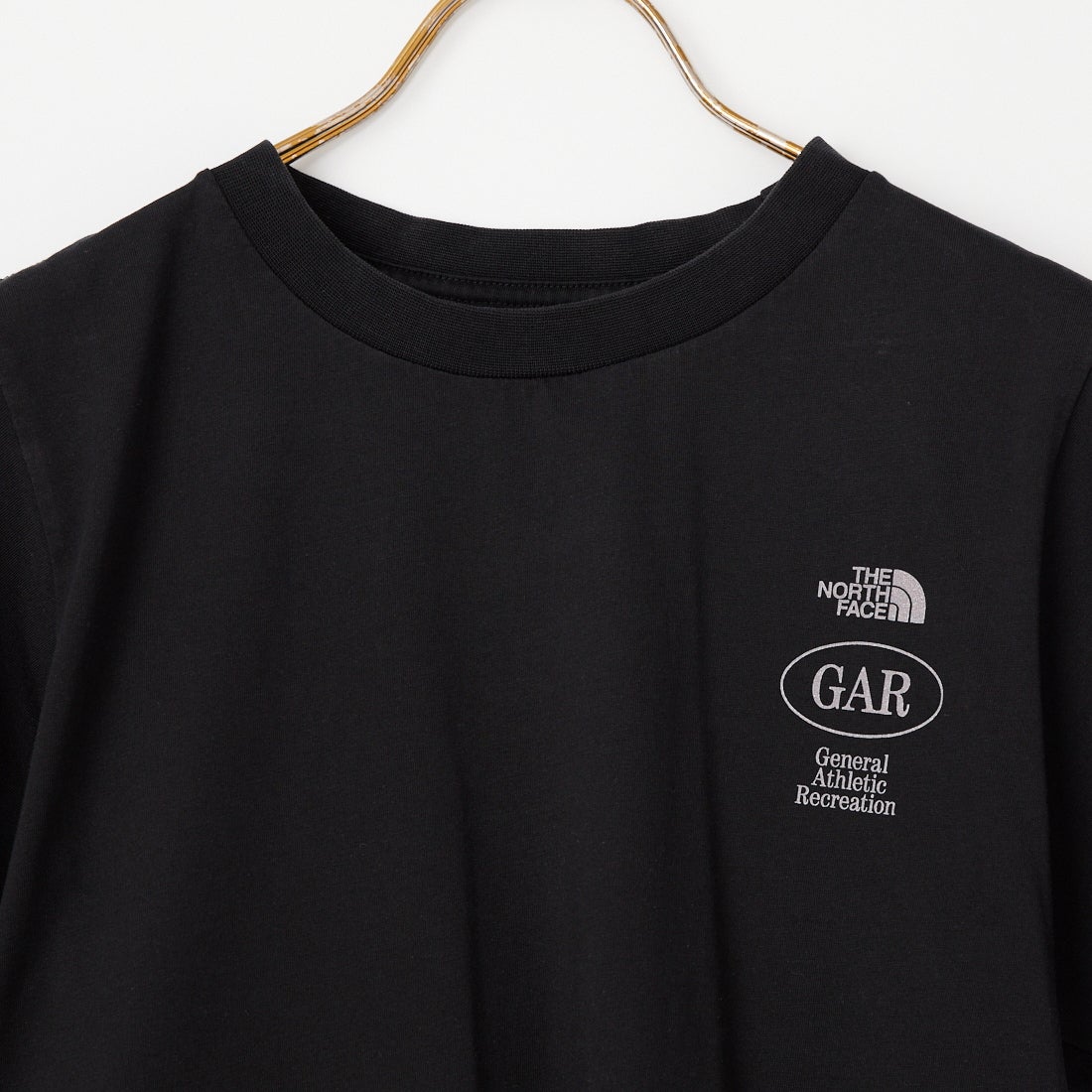 THE NORTH FACE [ザ ノースフェイス] GARスモーラー タイポグラフィックショートスリーブTシャツ [NT32667] K