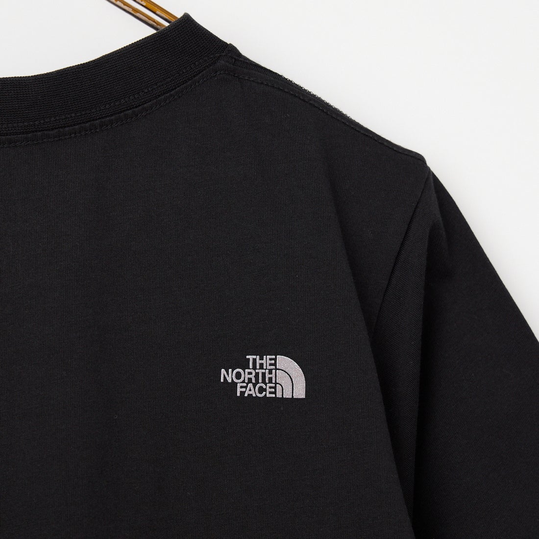 THE NORTH FACE [ザ ノースフェイス] GARスモーラー タイポグラフィックショートスリーブTシャツ [NT32667] K
