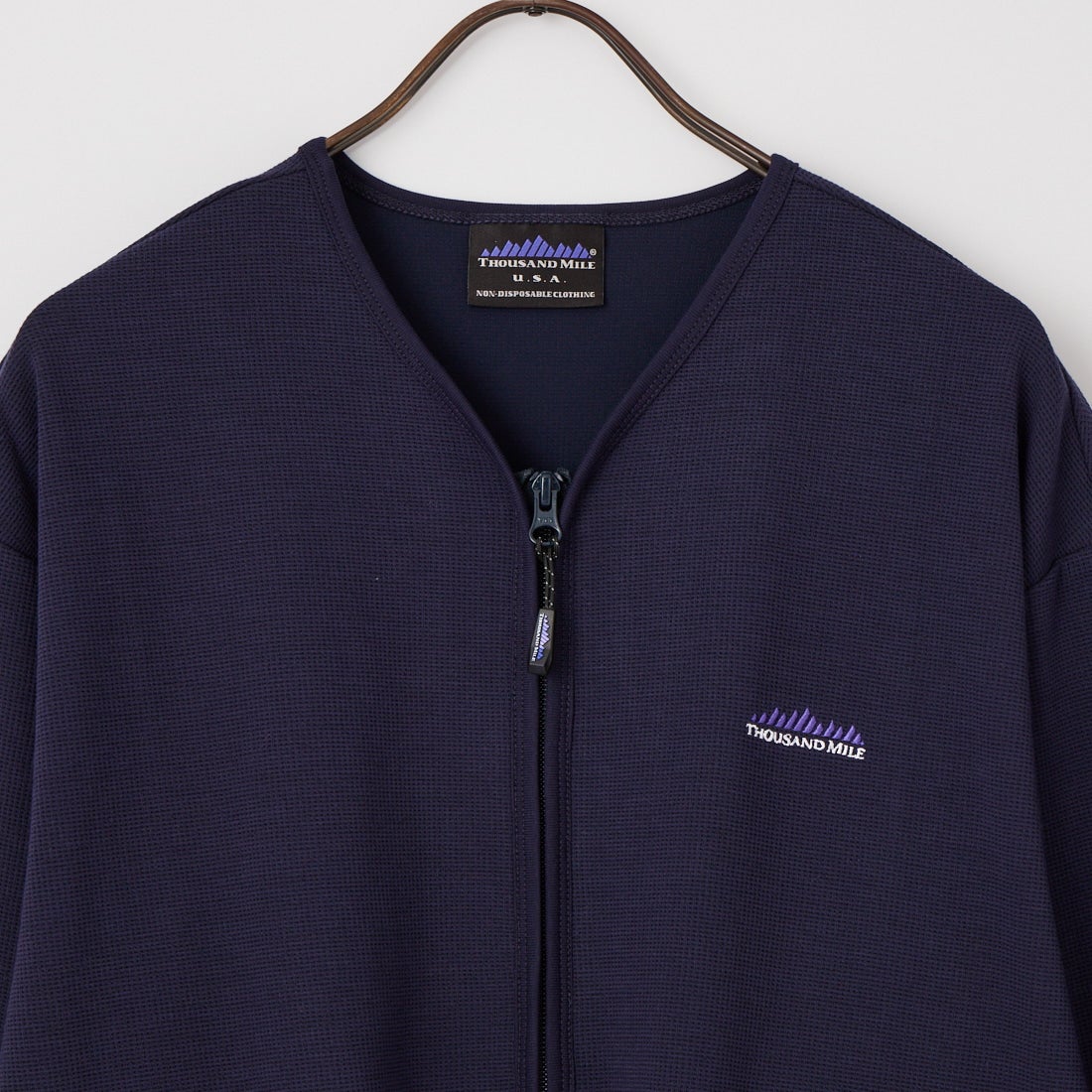 THOUSAND MILE [サウザンド マイル] テックワッフルジップカーディガン [TM261WF00530] 79 NAVY