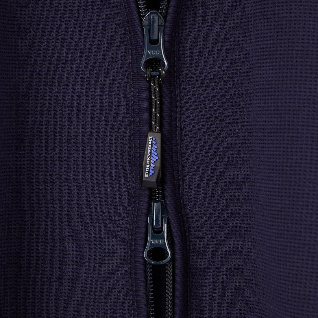 THOUSAND MILE [サウザンド マイル] テックワッフルジップカーディガン [TM261WF00530] 79 NAVY
