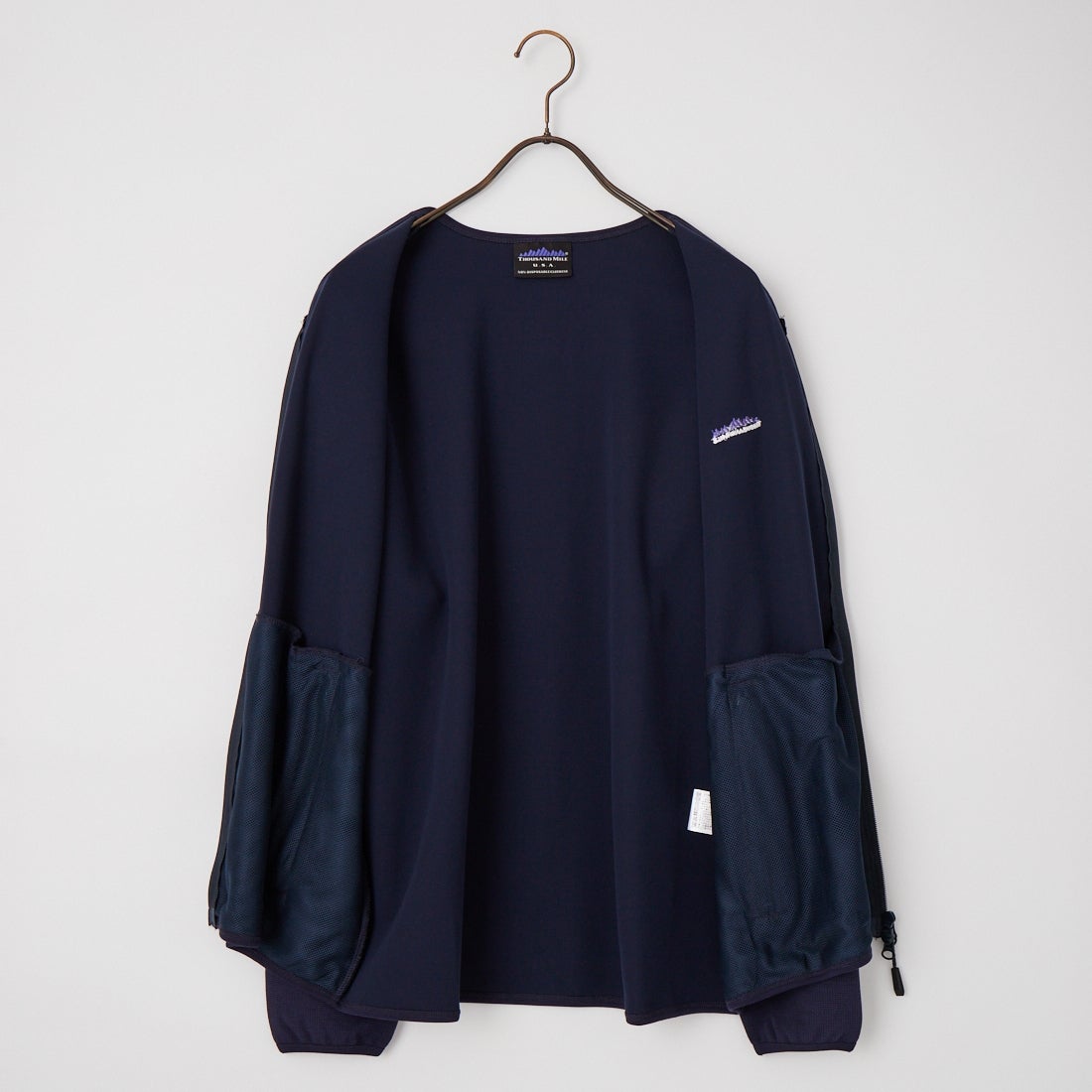 THOUSAND MILE [サウザンド マイル] テックワッフルジップカーディガン [TM261WF00530] 79 NAVY