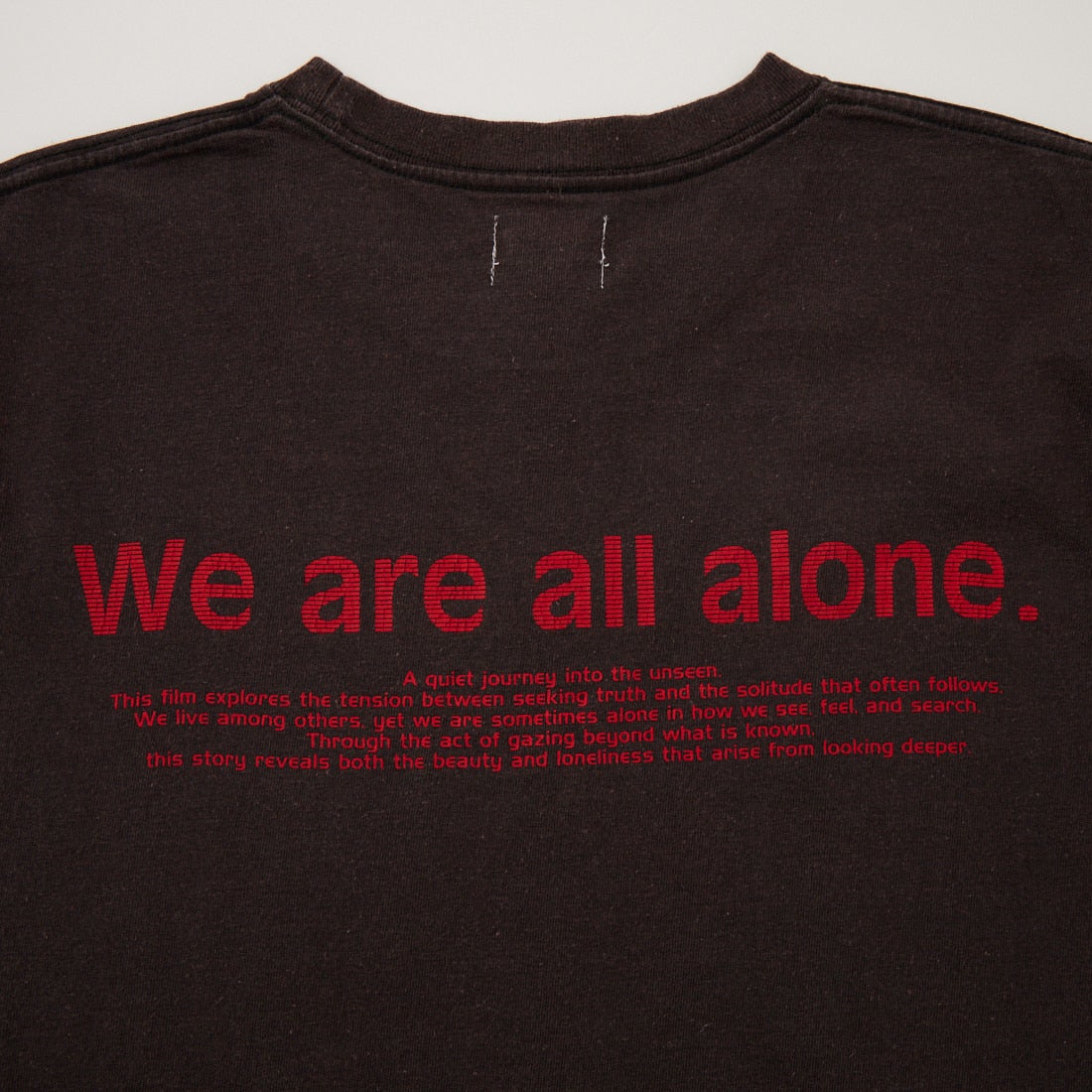 Name. [ネーム] WE ARE ALL ALONE ルーズフィットプリントTシャツ [NMCU-058] BLACK