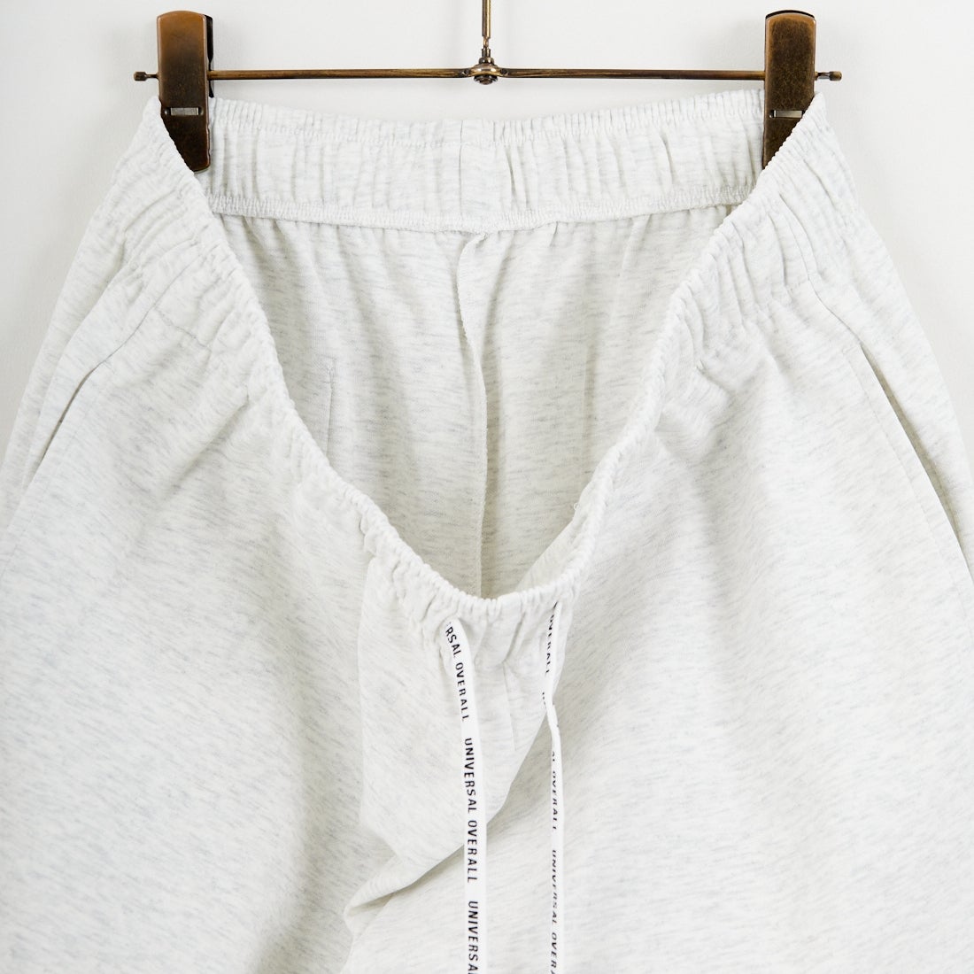 UNIVERSAL OVERALL [ユニバーサルオーバーオール] 別注 ワンポイントロゴ ポンチショートパンツ [U2611661IN-JF] ASH