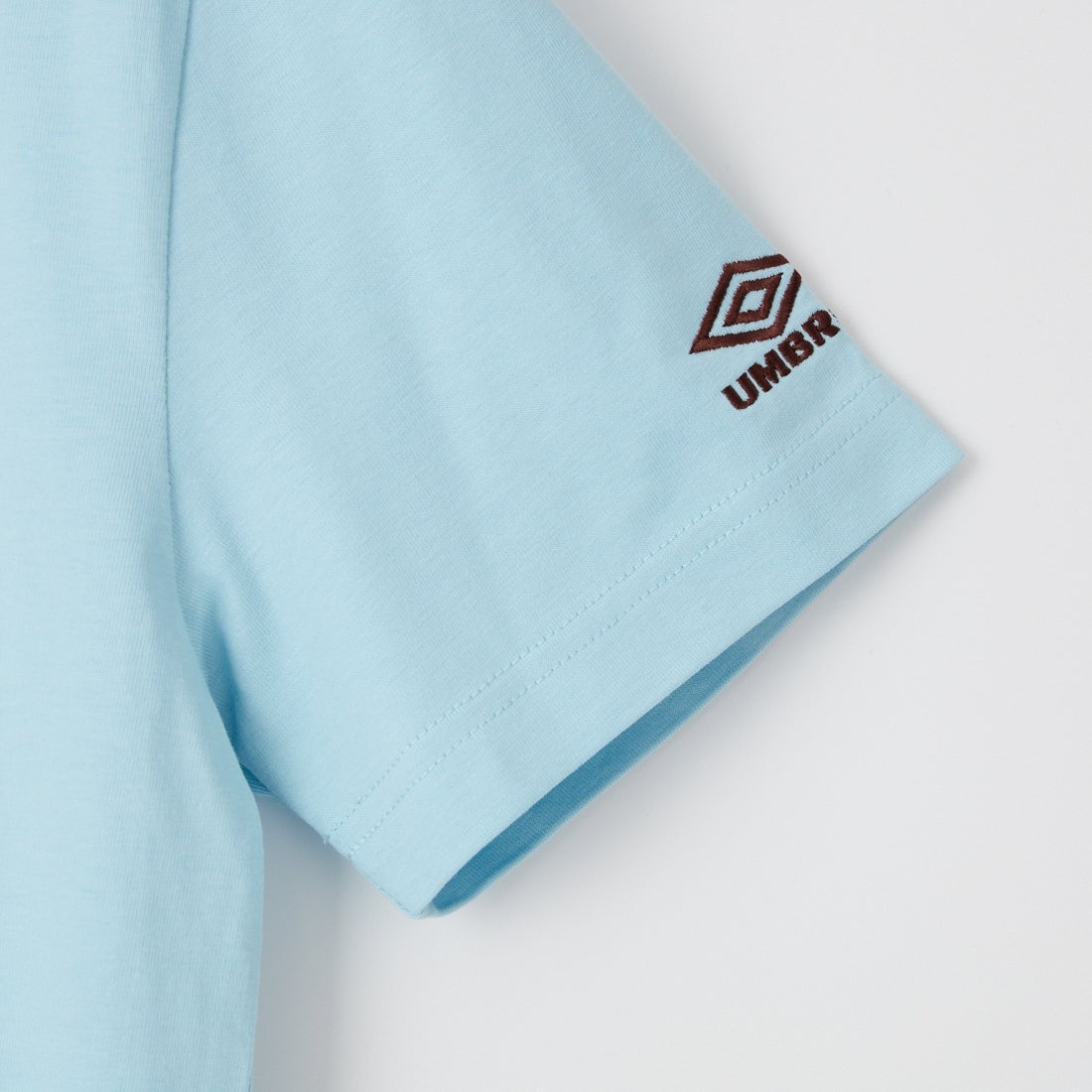 UMBRO [アンブロ] 別注 バックプリント コンパクトTシャツ [UMNK26SS-PO02-JF] BLUE