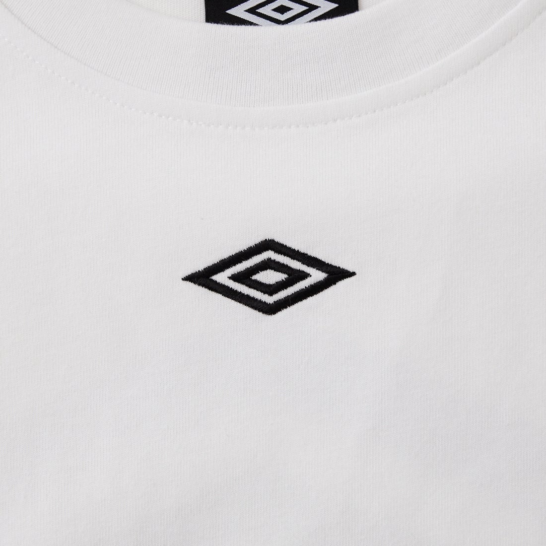 UMBRO [アンブロ] 別注 バックプリント コンパクトTシャツ [UMNK26SS-PO02-JF] WHITE