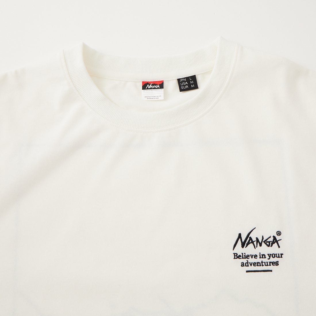 JEANSFACTORY × NANGA [ジーンズファクトリー × ナンガ] 別注 ドローコード付き バックプリントロングスリーブTシャツ [NW2602-JF] WHITE
