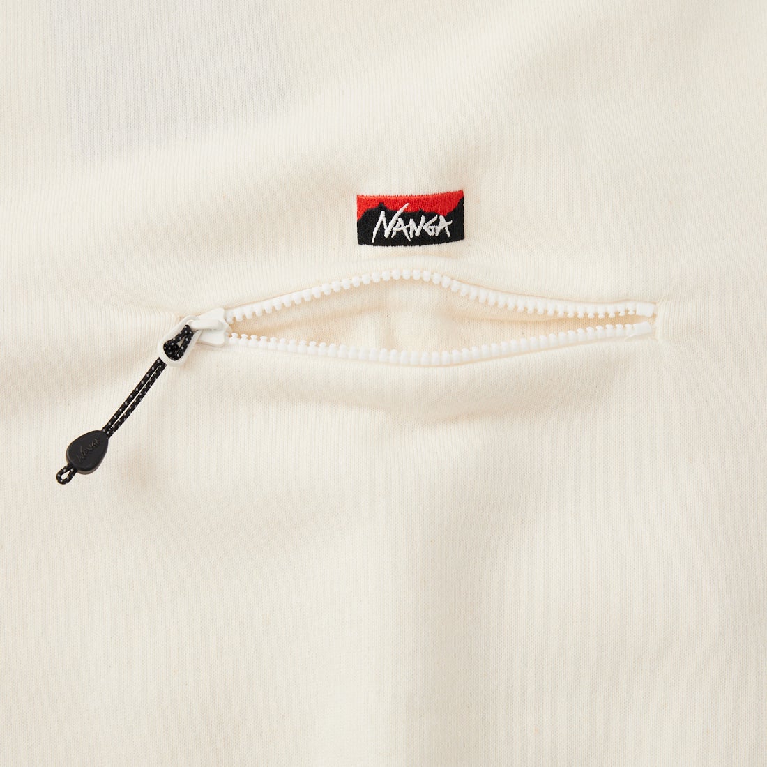 JEANSFACTORY × NANGA [ジーンズファクトリー × ナンガ] 別注 ジップポケット ロゴ刺繍スウェット [NW2603-JF] WHITE