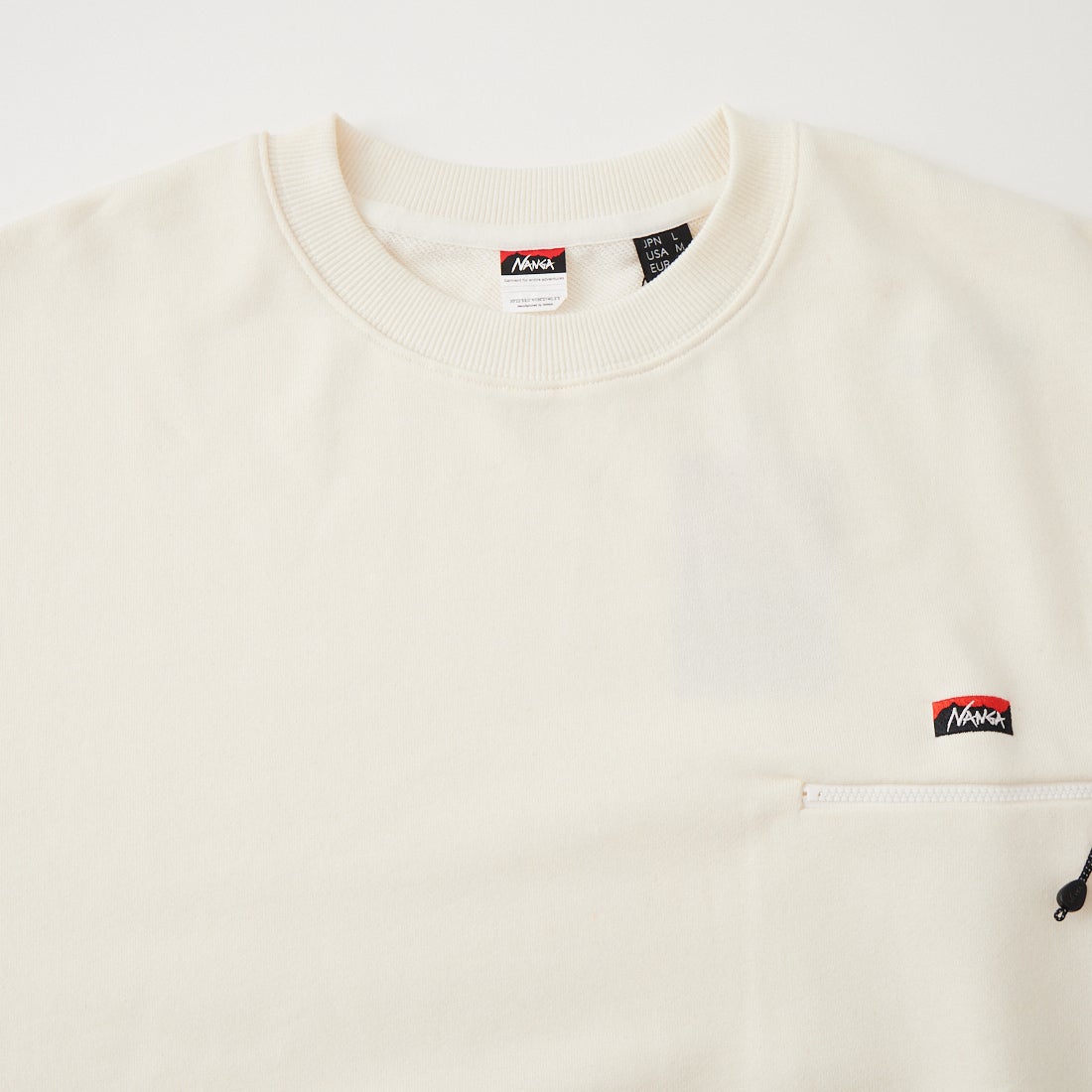JEANSFACTORY × NANGA [ジーンズファクトリー × ナンガ] 別注 ジップポケット ロゴ刺繍スウェット [NW2603-JF] WHITE