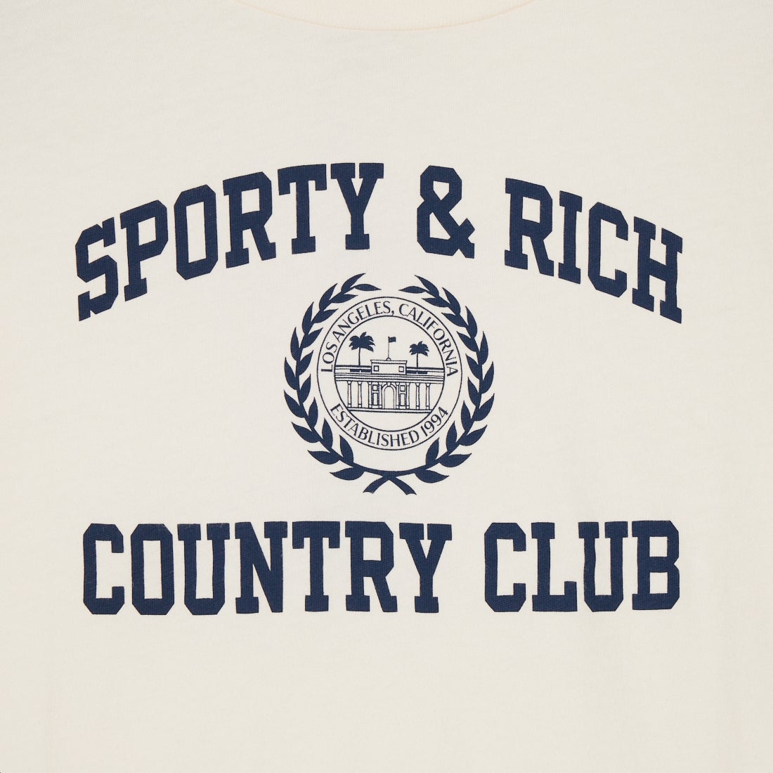Sporty&Rich [スポーティアンドリッチ] バーシティ クレストエッセンシャルTシャツ [SR02TO1117-6218] ECR NVY