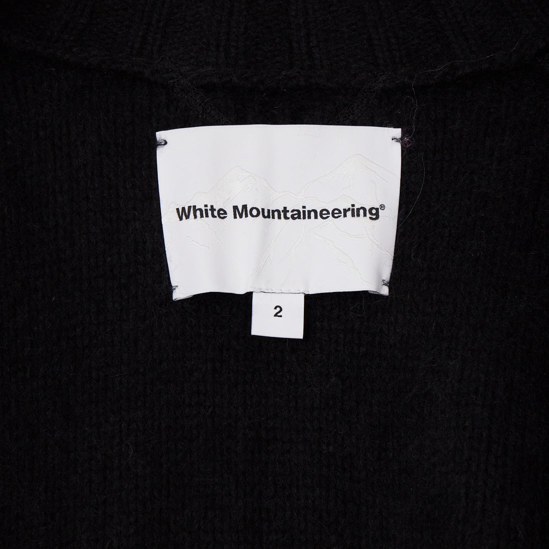 White Mountaineering [ホワイトマウンテニアリング] ラクーンドライバーズニットブルゾン [WM2673605] BLACK