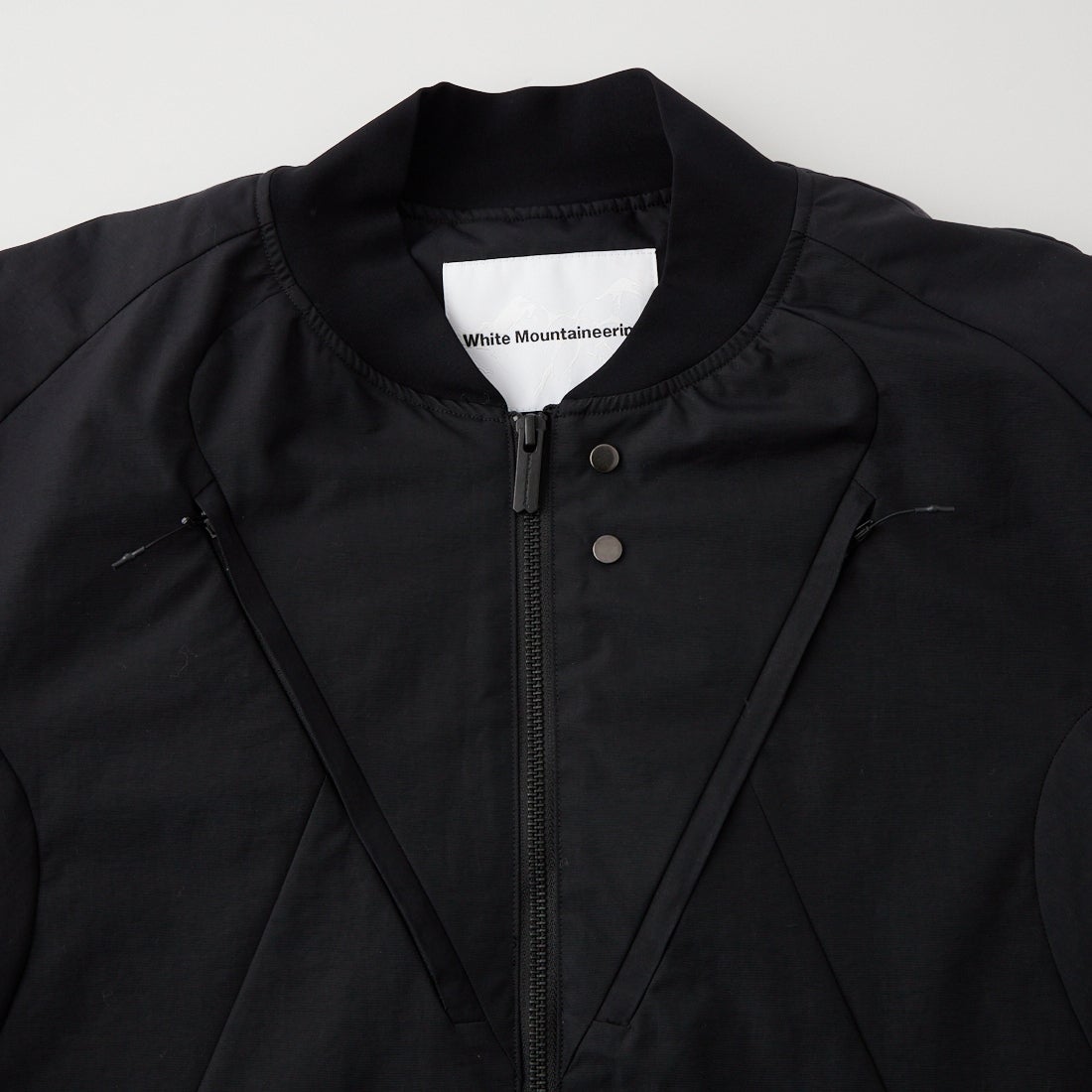 White Mountaineering [ホワイトマウンテニアリング] ウィンドストッパーラグランブルゾン [WM2673214] BLACK