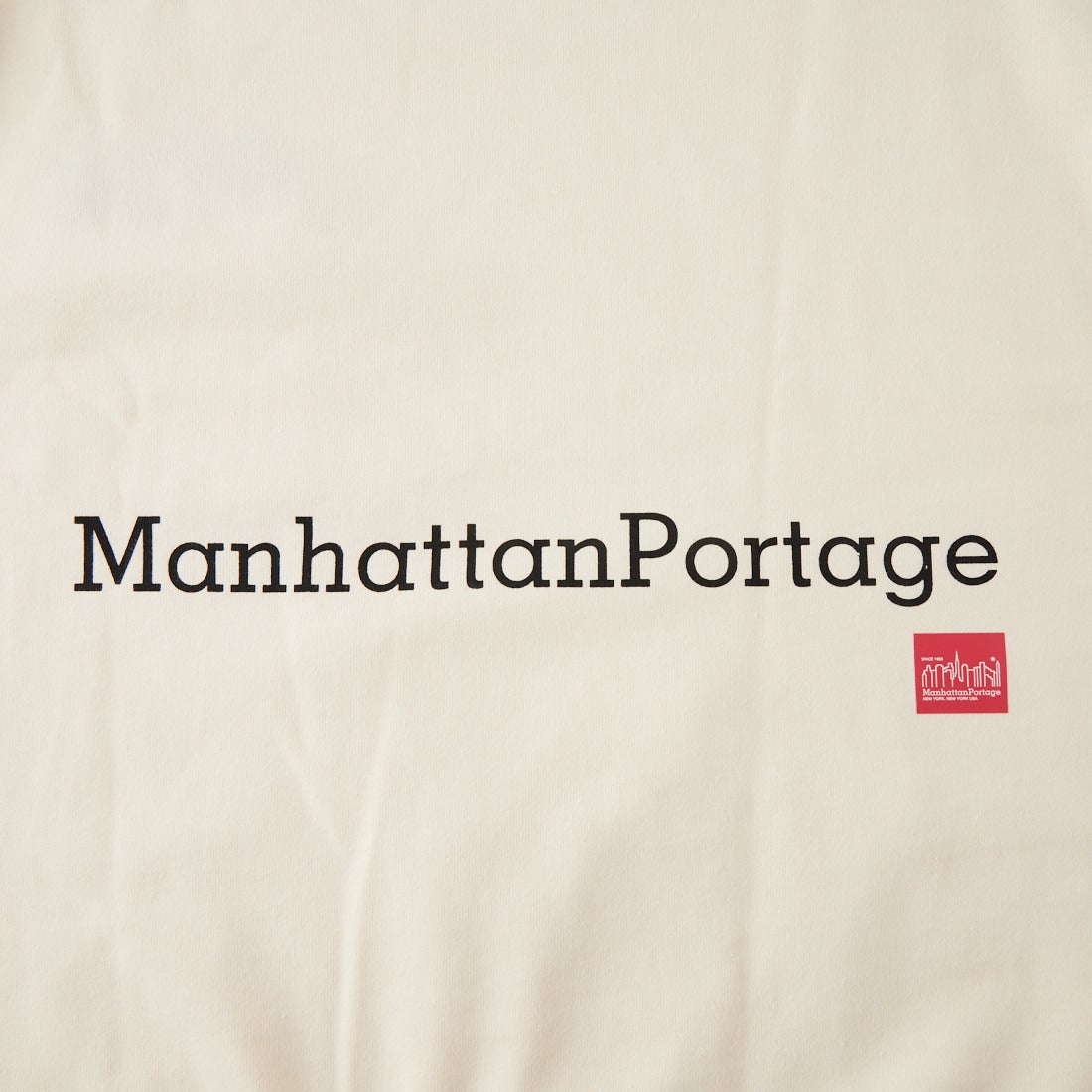 MANHATTAN PORTAGE [マンハッタンポーテージ] 別注 ポケットロゴ刺繍 バックプリントスウェット [26FWMP-IN86-JF] IVORY