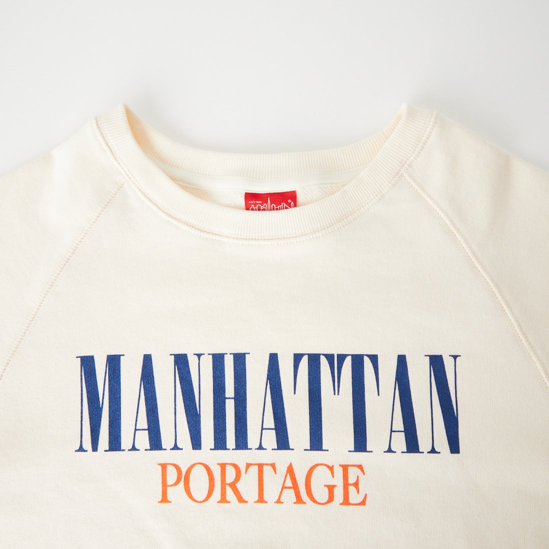MANHATTAN PORTAGE [マンハッタンポーテージ] 別注 ロゴプリント ショート丈カットオフスウェット [26FWMP-INL020-JF] IVORY