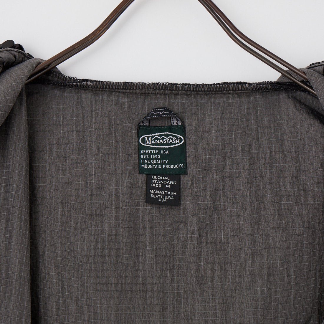 MANASTASH [マナスタッシュ] パネルウィンドブレーカー [792-6252005] 010 BLACK