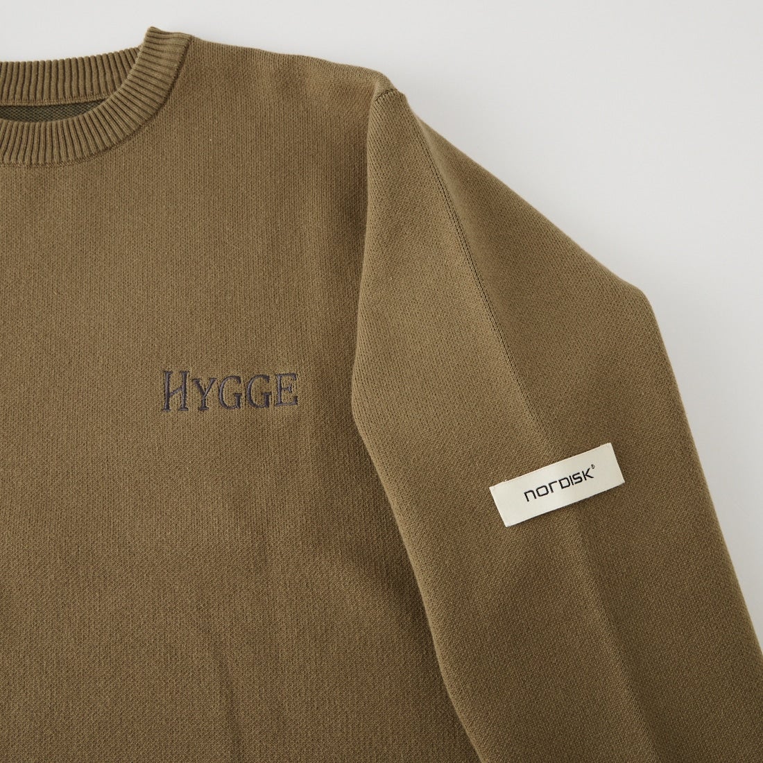 NORDISK [ノルディスク] 別注 HYGGE バックロゴジャガードニット [NU21802-JF] BEIGE